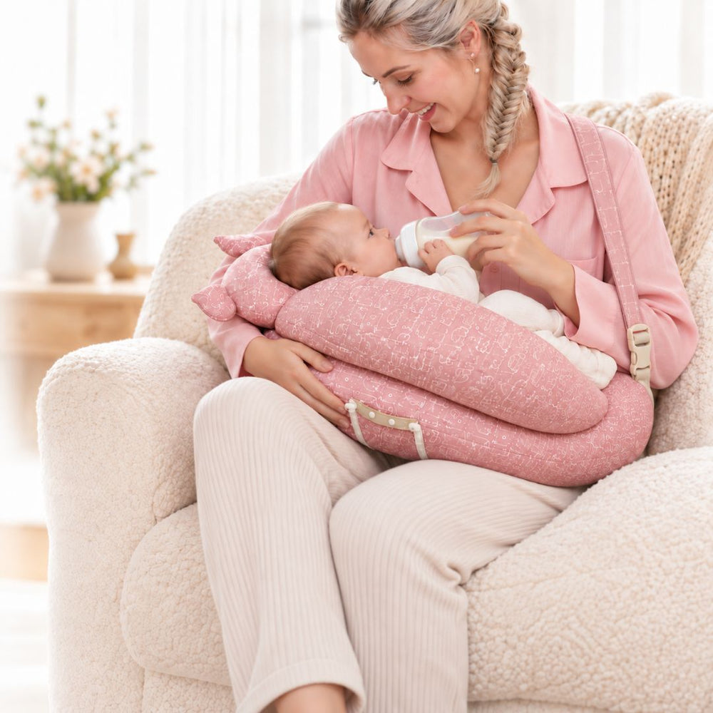 Baby relaxing in a soft support nest
